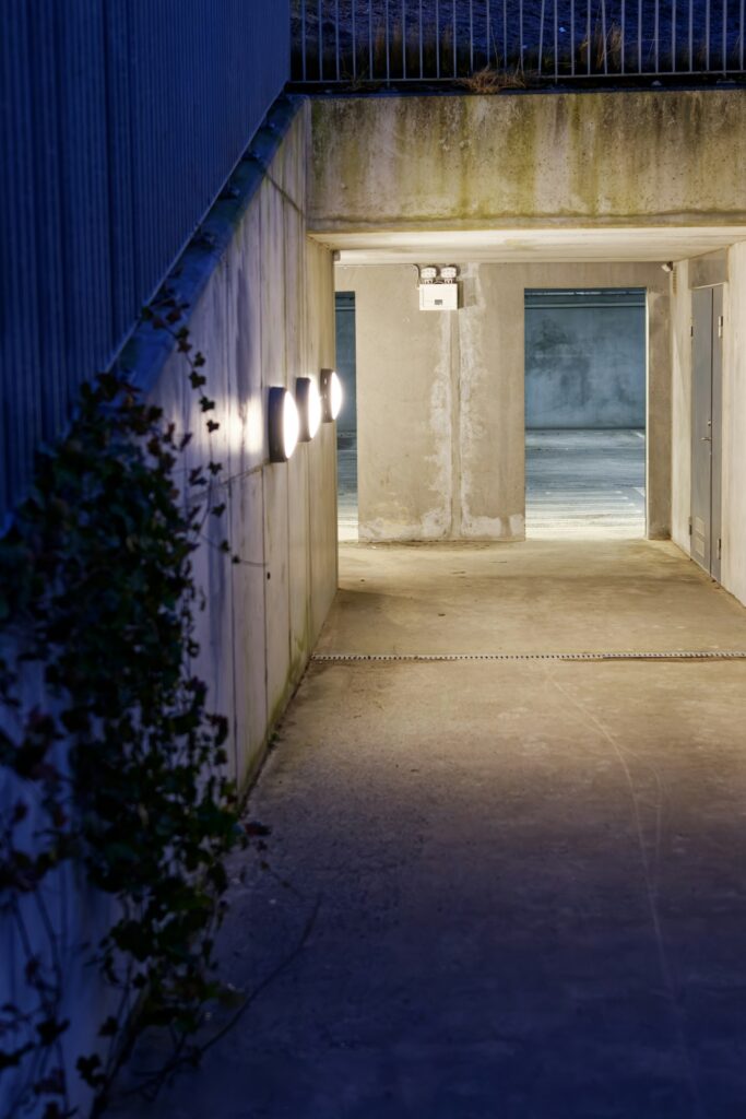 an empty building with a bunch of lights on it