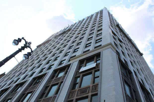 The historic David Whitney Building, built in 1915, underwent an extensive $92 million restoration turning it into a mixed-use development to include hotel space, luxury apartments, and restaurants.