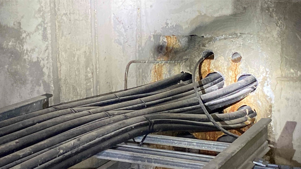 Main source of water ingress was through pipe sleeve penetrations